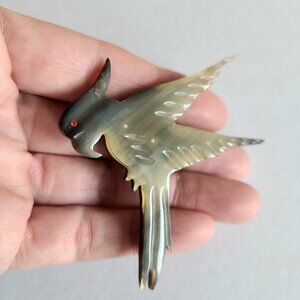 Large vintage horn bird brooch